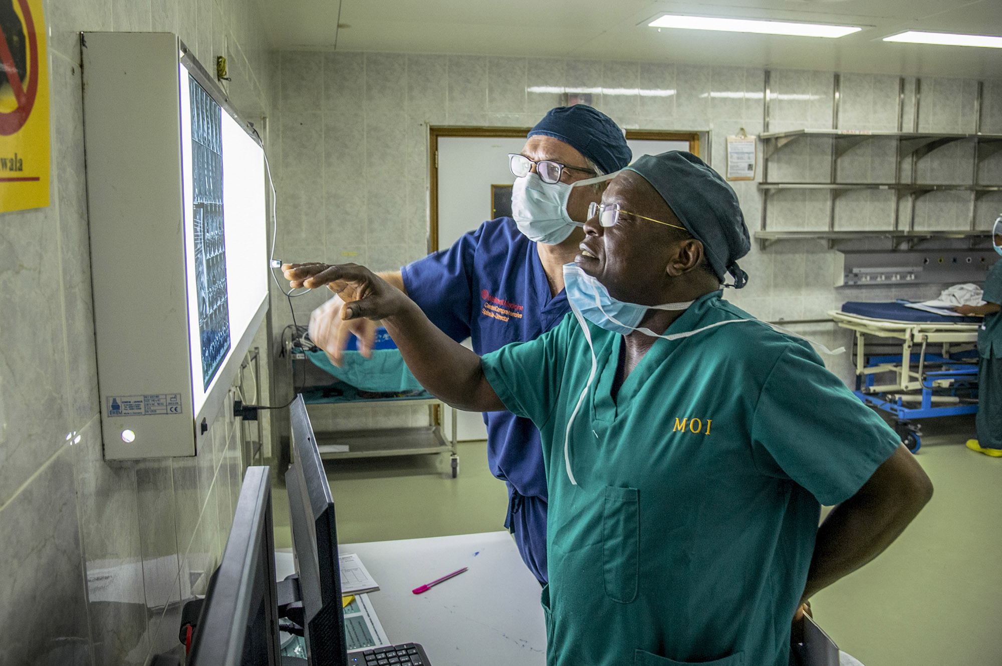 Physicans_discussing_x-rays_hospital_africa.jpg
